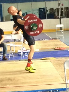 Pictured here: Eric, getting FULL EXTENSION on his olympic lifts.